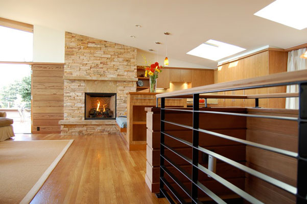 60's Modern Home remodel-living room, kitchen and fireplace.  Open floor plan.