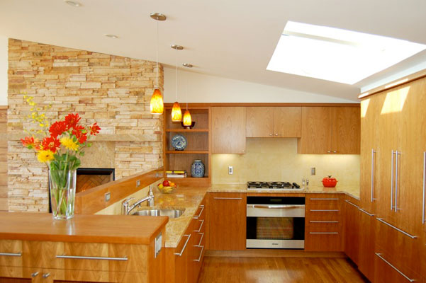 60's modern home remodel - custom kitchen with new skylight and concealed appliances