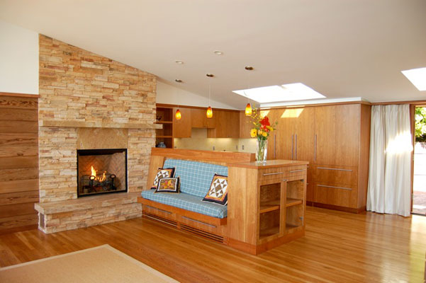 60's modern home remodel - stone fireplace with built in seat