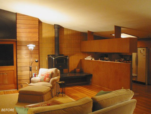 60's home - before shot showing wood stove and kitchen.