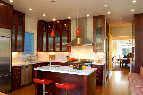 New kitchen with custom cabinets and bar seating at the island.
