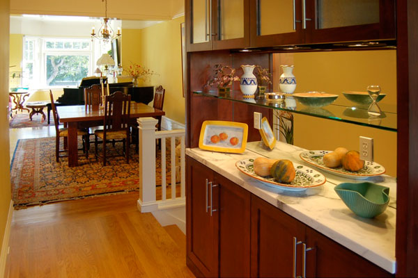 View from addition through original dining room and into the living room.