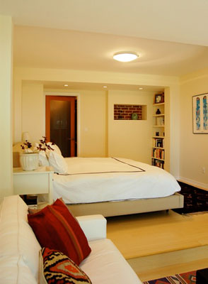View of master bedroom from sitting area