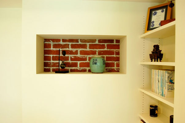 detail of niche with exposed brick
