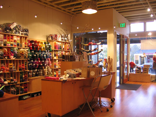 Interior shot showing the custom designed work table and shelving